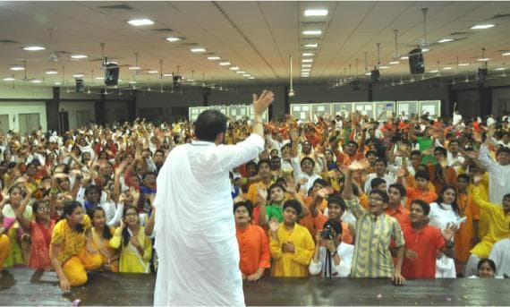 Children celebrating at a Shrimad Rajchandra Divinetouch programme
